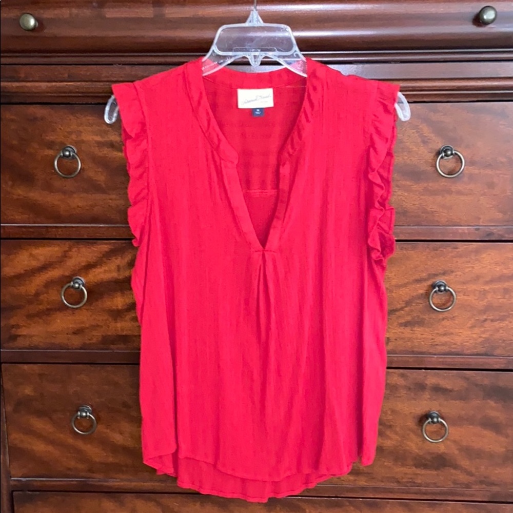 Sleeveless red top